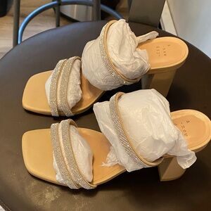 Worn once for wedding crystal / nude slip on sandals sz 7.5 w